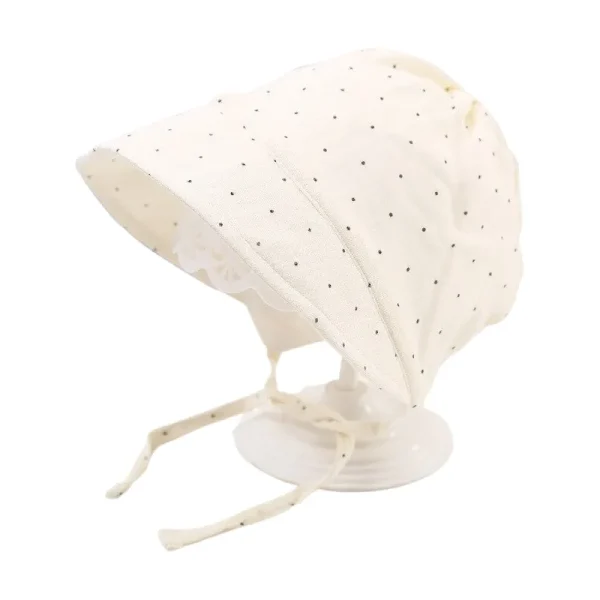 chapeau bébé à pois beige